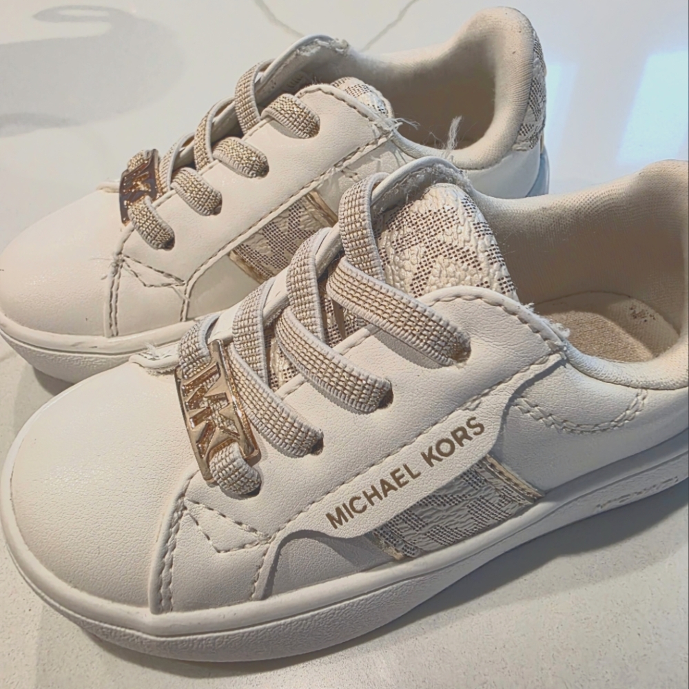 Childrens Size 5 Michael Kors White Sneakers with Leather Upper and Rubber Sole.
